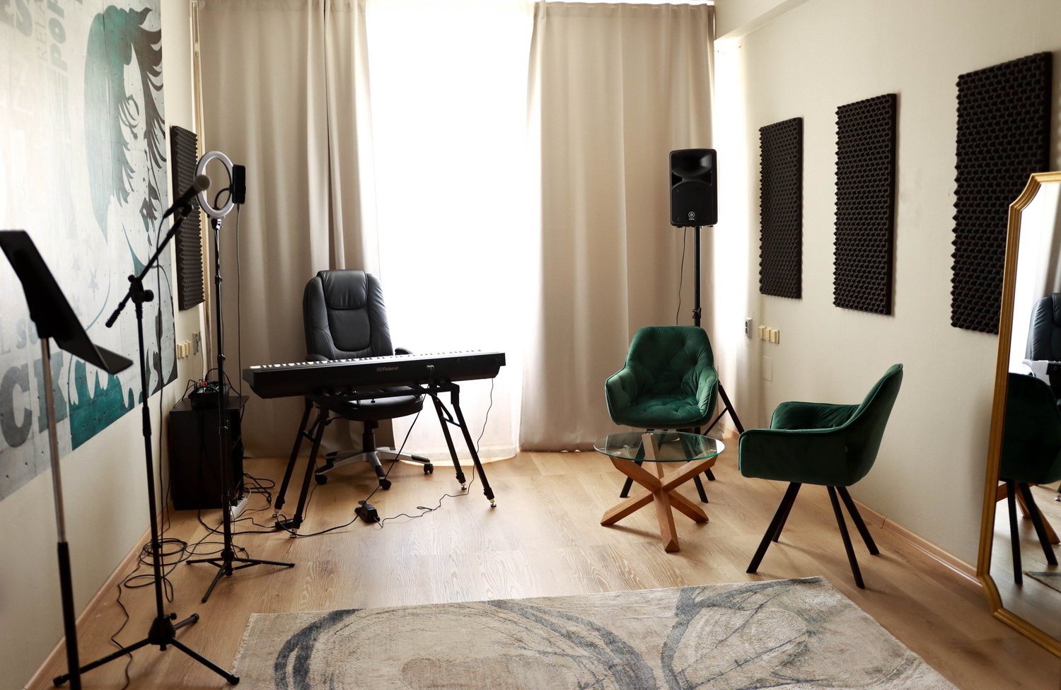 Second Singasong studio with a keyboard, microphone and armchairs
